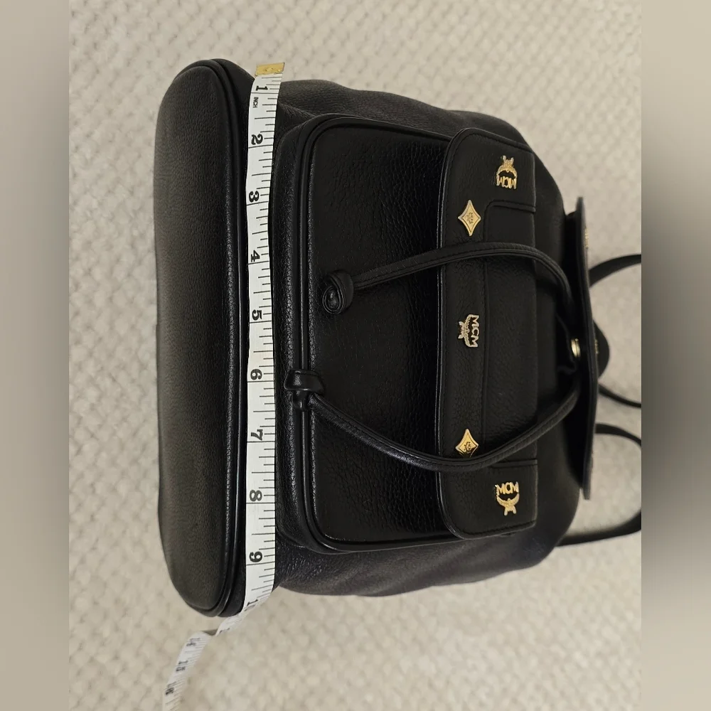 MCM Black Leather Studded Backpack Gold Hardware Drawstring Side Zip